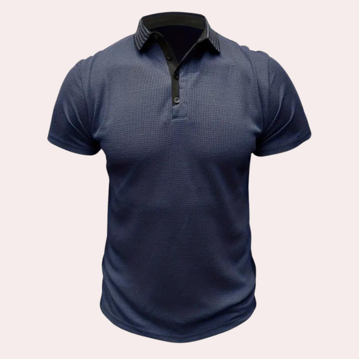 Donkerblauw poloshirt voor heren met korte mouwen, knoopsluiting en geribbelde kraag. Stijlvol en casual, perfect voor dagelijks gebruik.