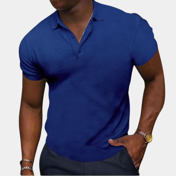 Donkerblauw poloshirt voor heren, korte mouwen, casual stijl. Perfect voor zomerse outfits. Comfortabel en modieus, ideaal voor dagelijks gebruik.