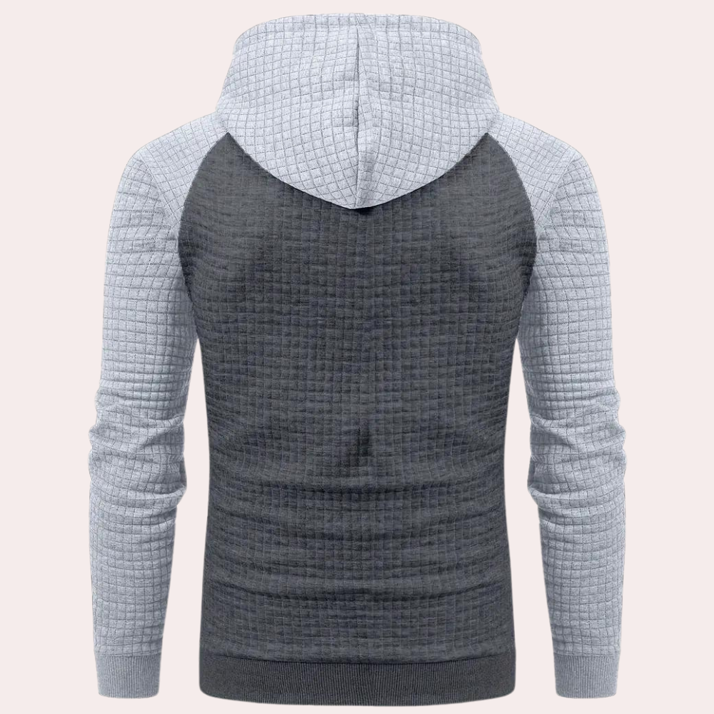 Grijze herenhoodie met capuchon, geruit patroon, lange mouwen. Comfortabele casual kleding, ideaal voor dagelijks gebruik en sportieve activiteiten.
