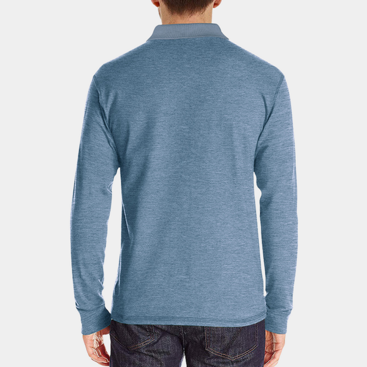Blauwe herenpolo met lange mouwen, gemaakt van katoenmix. Casual en comfortabel, ideaal voor dagelijks gebruik. Perfect voor herfst- en wintermode.
