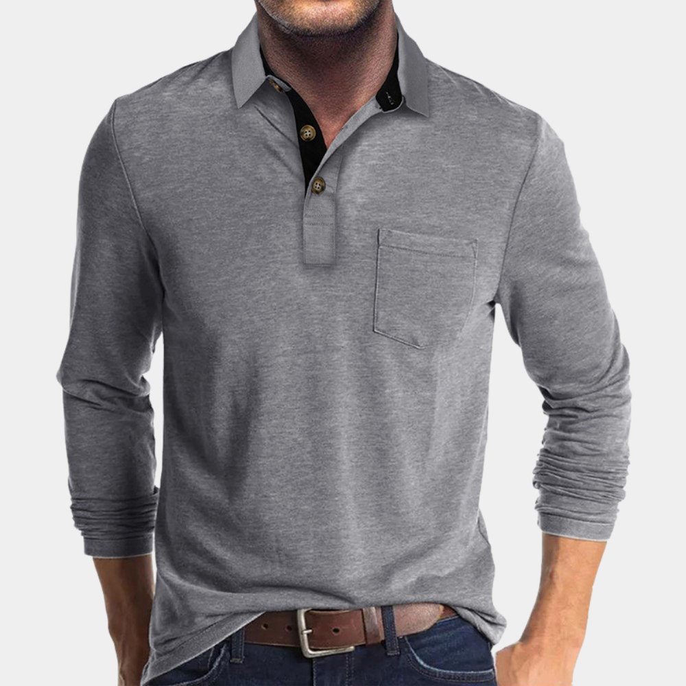 Grijze herenpolo met lange mouwen, borstzak en knoopsluiting. Stijlvolle casual herenkleding, ideaal voor dagelijks gebruik en comfort.