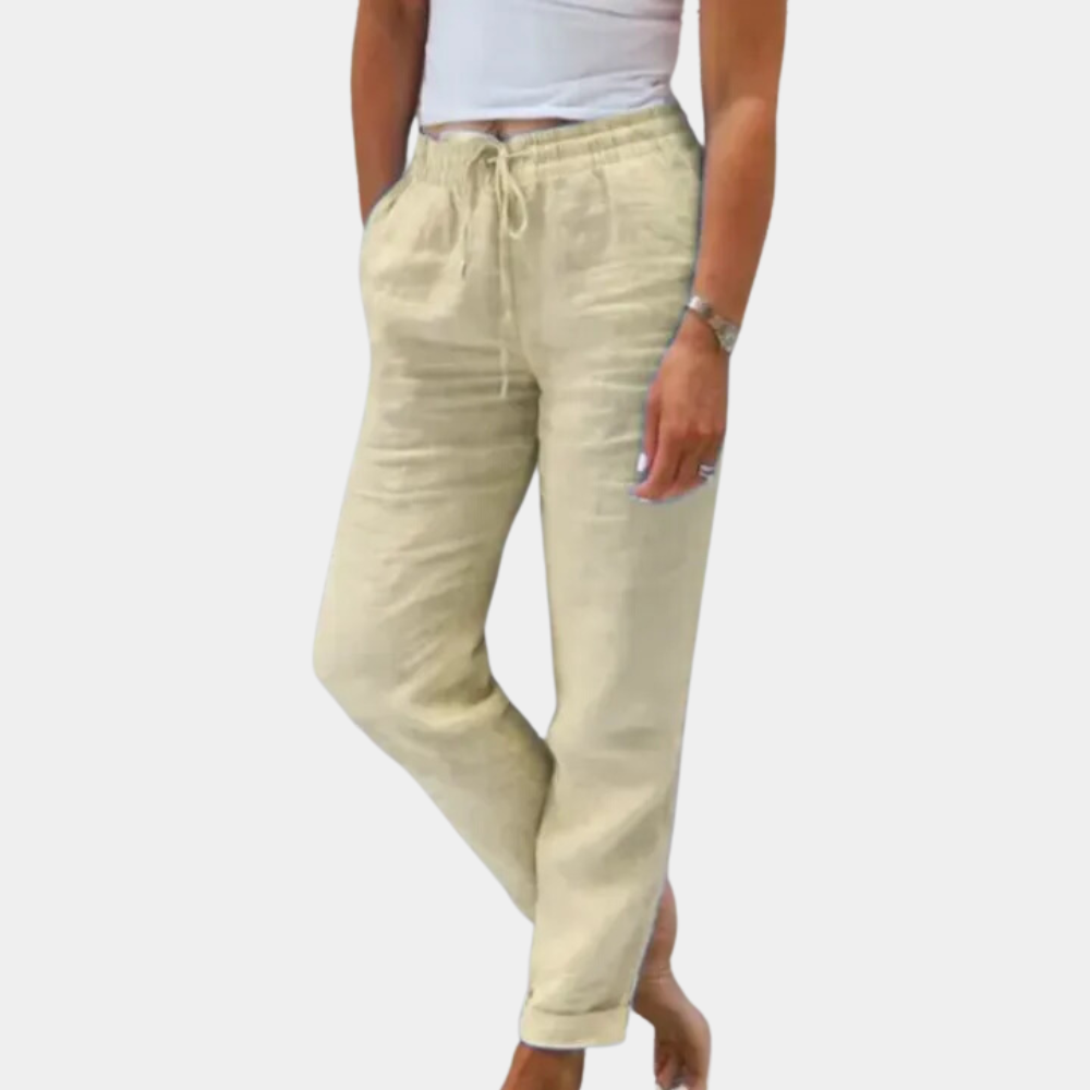 Vrouw draagt khaki linnen broek met elastische taille en trekkoord, casual stijl, comfortabele pasvorm, ideaal voor zomermode en dagelijks gebruik.