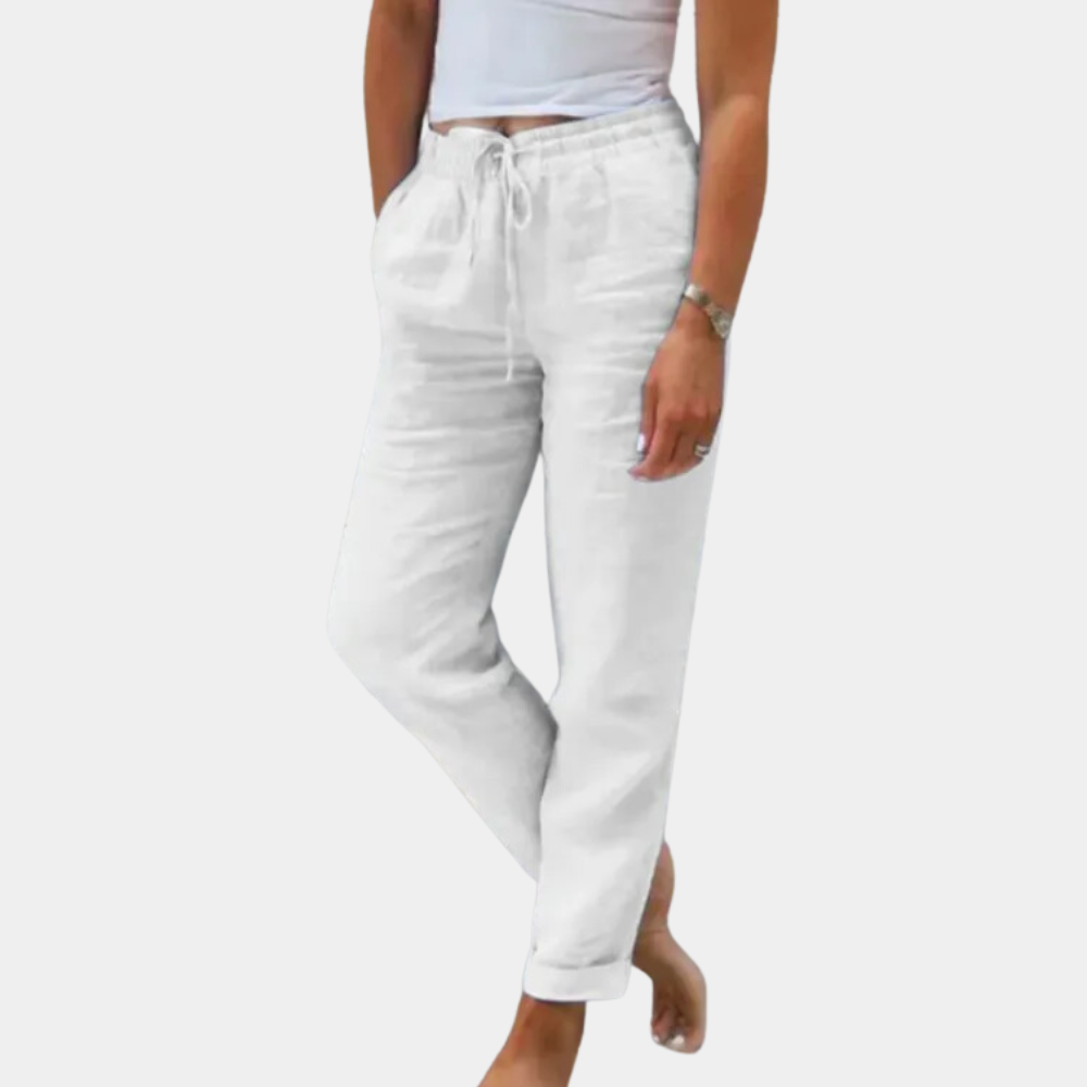 Vrouw draagt witte linnen broek met trekkoord, casual stijl, comfortabele pasvorm, ideaal voor zomermode. Perfect voor dagelijks gebruik.