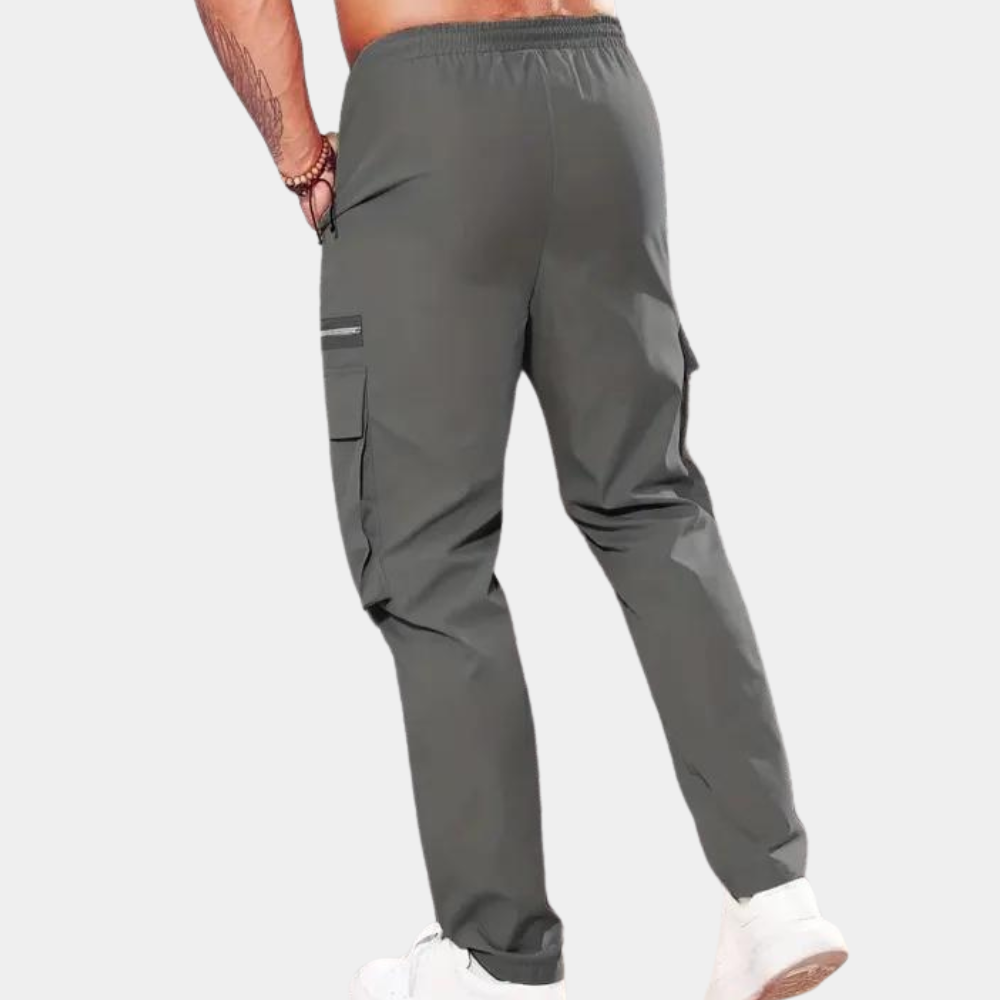 Grijze heren cargo broek, elastische tailleband, zijzakken, casual stijl, geschikt voor dagelijks gebruik. Comfortabele pasvorm, trendy design.