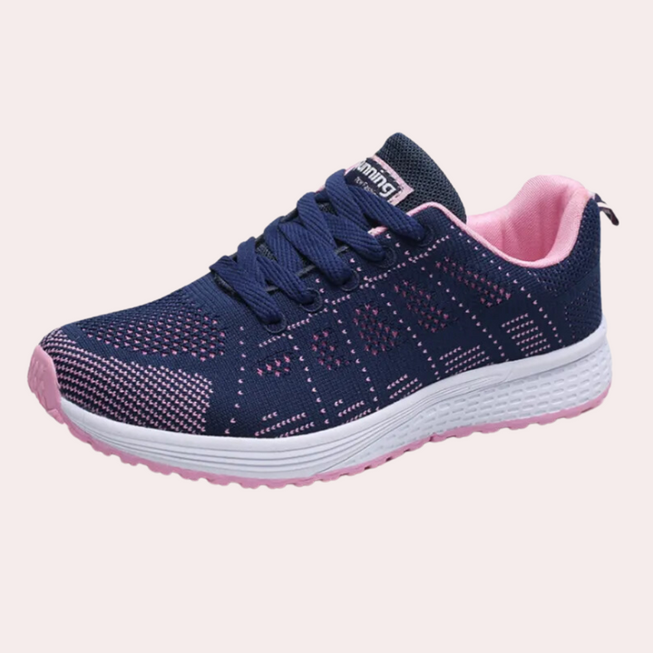 Donkerblauwe en roze sportschoen voor dames, ademend mesh bovenwerk, comfortabele zool, ideaal voor hardlopen en fitness.