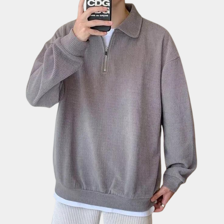 Grijze heren trui met halve rits en kraag, casual stijl, comfortabele pasvorm, ideaal voor herfst en winter. Perfect voor modieuze herenkleding.