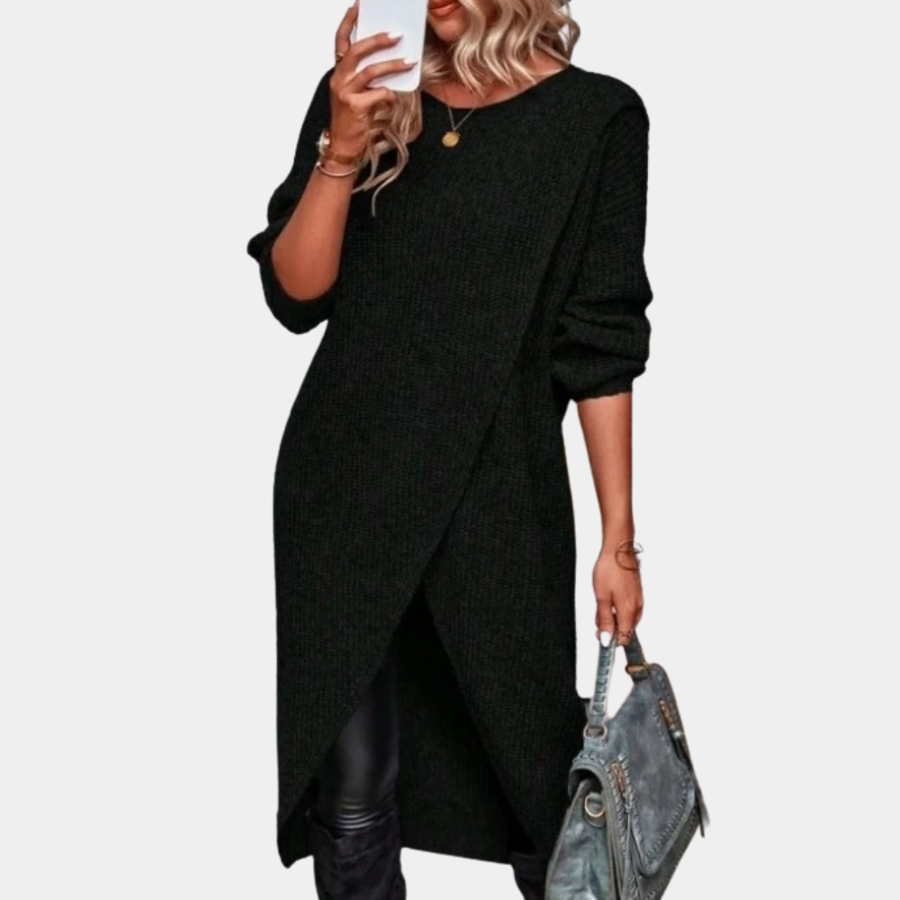 Zwarte oversized damestrui met lange mouwen, asymmetrische zoom en ronde hals. Modieuze herfst- en winterkleding, ideaal voor casual en chique looks.