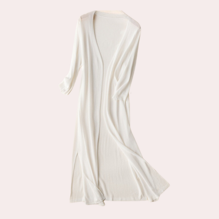 Witte dames kimono badjas, lange mouwen, zachte stof, elegant design, ideaal voor thuiscomfort, luxe loungewear, modieuze ochtendjas.