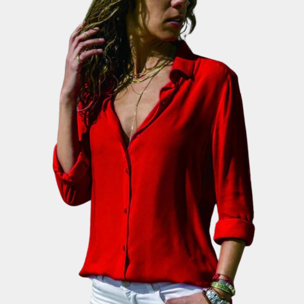 Rode damesblouse met lange mouwen, knoopsluiting en opgerolde manchetten. Stijlvolle casual outfit, ideaal voor modieuze dames.