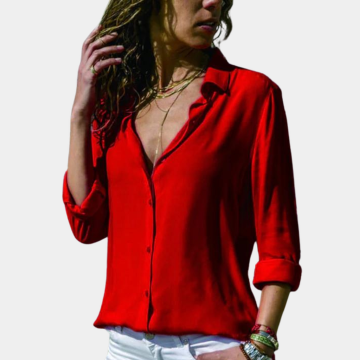 Rode damesblouse met lange mouwen, knoopsluiting en opgerolde manchetten. Stijlvolle casual outfit, ideaal voor modieuze dames.