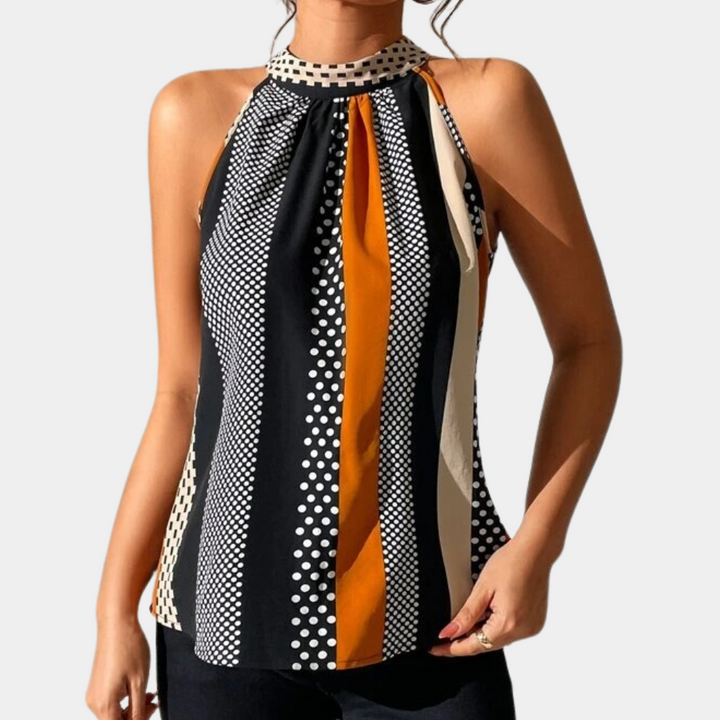 Oranje en zwarte haltertop met stippen en strepen, damesmode, zomerblouse, stijlvolle casual outfit, trendy kleding, modieuze top.