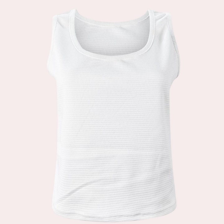 Witte dames tanktop met ronde hals, gemaakt van ademend katoen. Perfect voor casual zomeroutfits. Comfortabele pasvorm, veelzijdig en stijlvol.