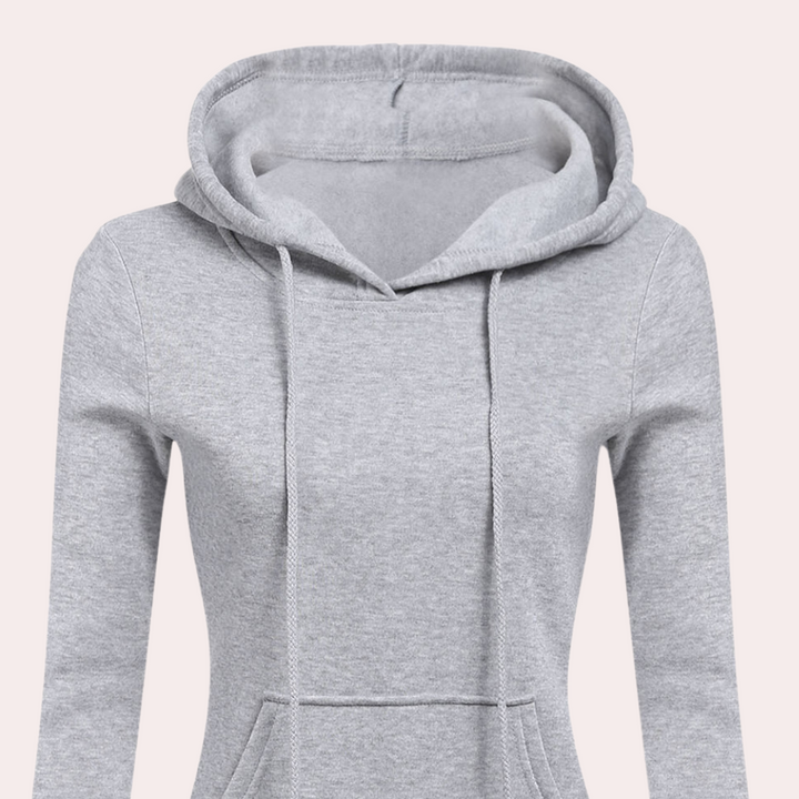 Grijze dames hoodie met capuchon en buidelzak, casual en comfortabel, ideaal voor dagelijks gebruik. Perfecte pasvorm en zachte stof.