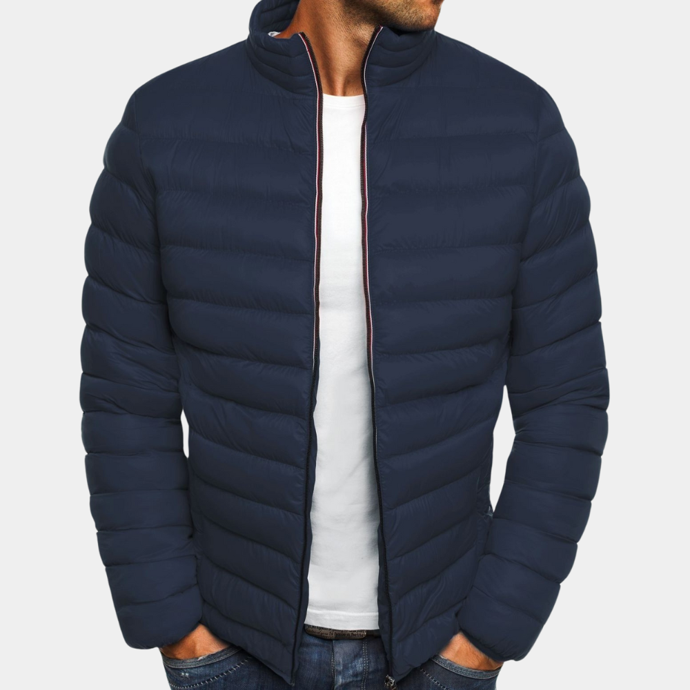 Donkerblauwe gewatteerde jas voor heren, stijlvolle winterjas met ritssluiting, ideaal voor casual en outdoor activiteiten.