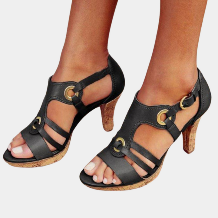 Zwarte leren sandalen met open teen en kurken hak, elegante damesmode, perfect voor zomerse outfits en casual chic stijlen.