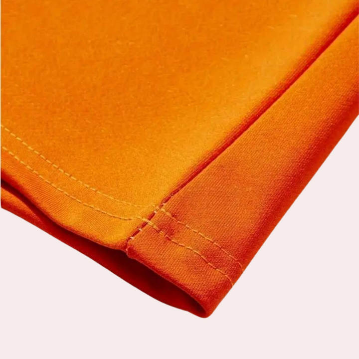 Oranje T-shirt zoom, naad en stoftextuur, Odhran collectie. Hoogwaardige katoenen kleding, modetrend, comfortabele pasvorm, duurzame kwaliteit.