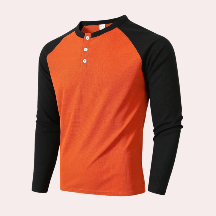 Oranje en zwart heren raglan henley shirt met lange mouwen en knoopsluiting, casual en stijlvol, perfect voor dagelijks gebruik en sportieve activiteiten.