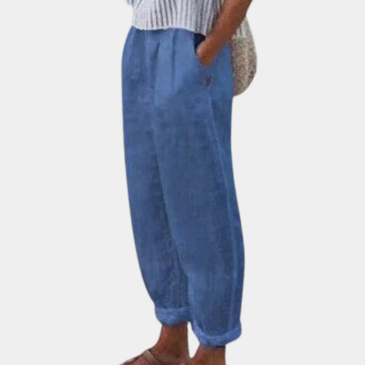 Blauwe linnen broek voor dames, casual en comfortabel, met elastische tailleband. Perfect voor zomerse outfits en dagelijks gebruik.