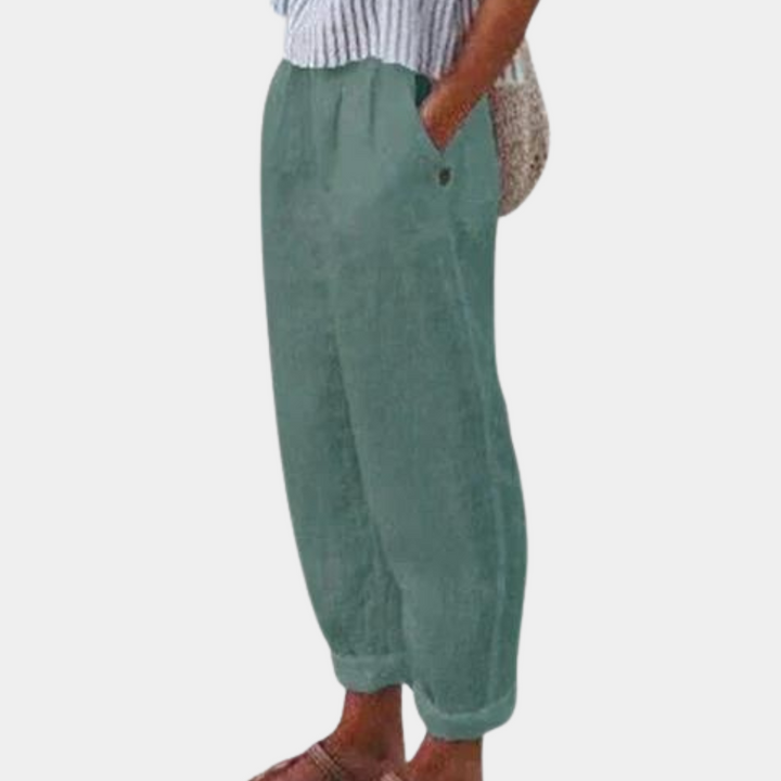 Groene linnen broek voor dames, casual en comfortabel, met elastische tailleband en losse pasvorm. Perfect voor zomerse outfits en dagelijks gebruik.