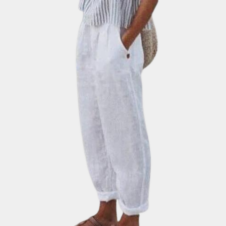 Witte linnen broek voor dames, casual en luchtig ontwerp, ideaal voor zomerse outfits. Comfortabele pasvorm met elastische tailleband.