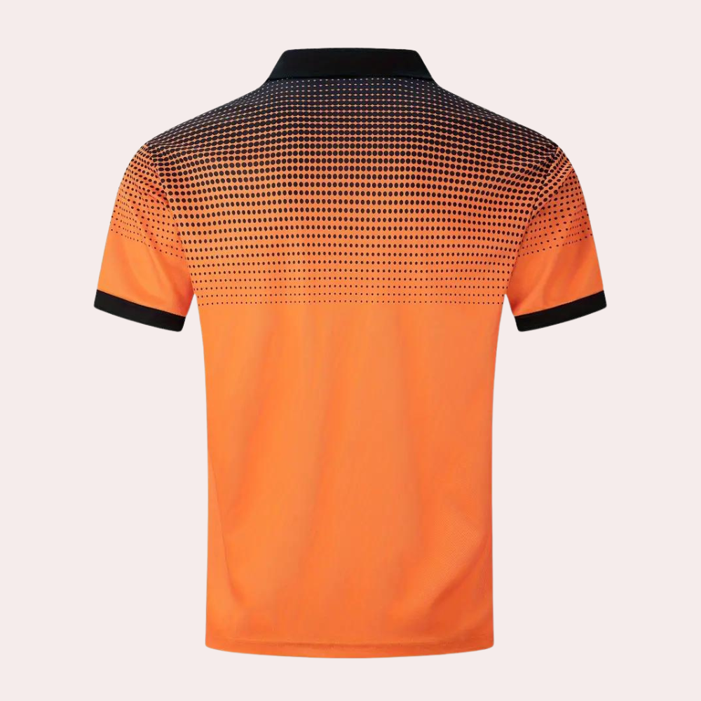 Oranje poloshirt met zwarte kraag en mouwboorden, pixelpatroon op de schouders. Stijlvol herenshirt, casual mode, sportieve uitstraling.