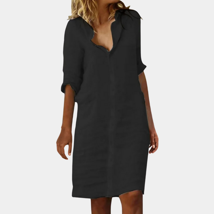 Zwarte damesjurk met driekwart mouwen en V-hals, casual stijl. Perfect voor dagelijks gebruik. Comfortabele pasvorm, modieus en veelzijdig.
