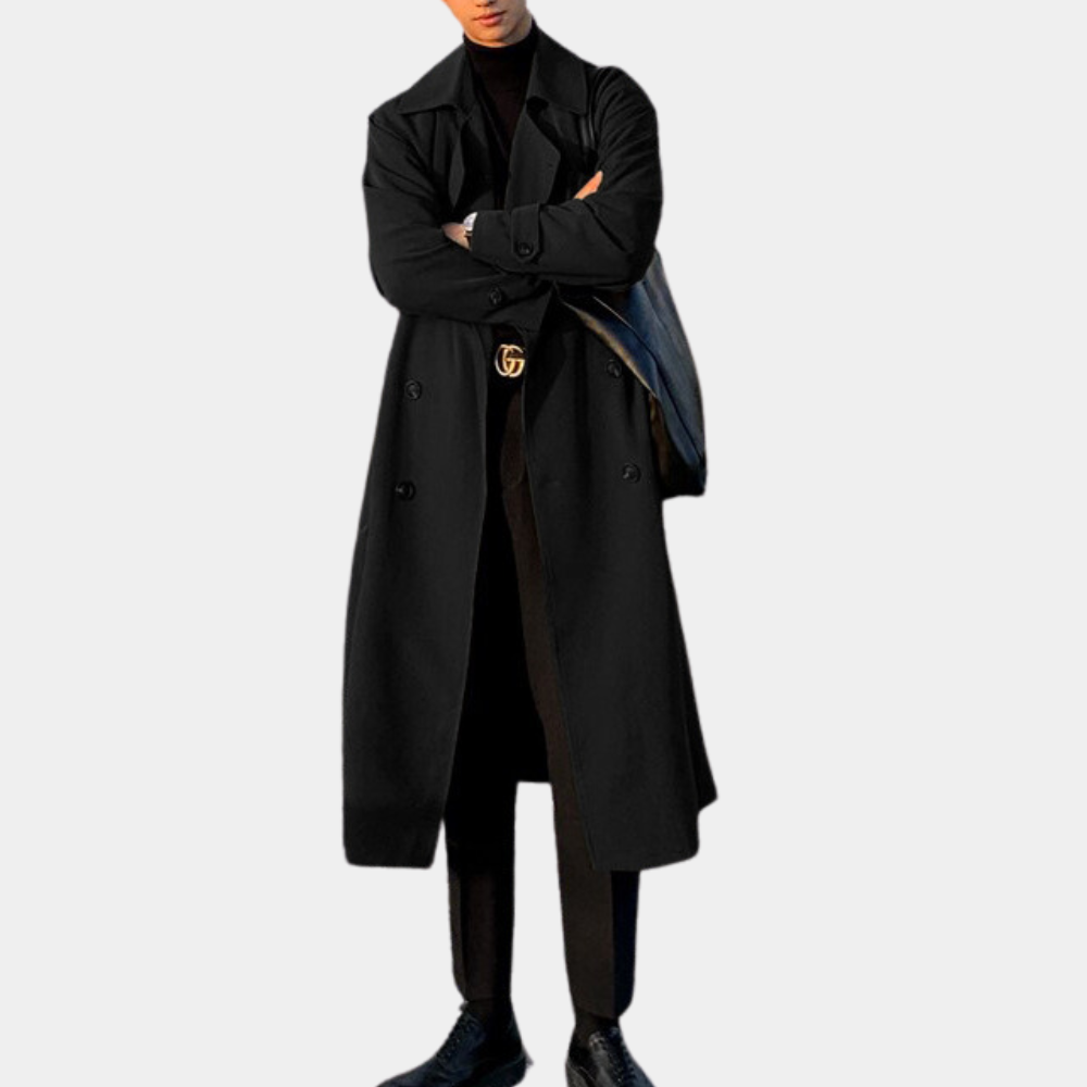 Zwarte lange trenchcoat voor heren, stijlvol en elegant, met dubbele rij knopen en ceintuur. Perfect voor herfst- en wintermode.