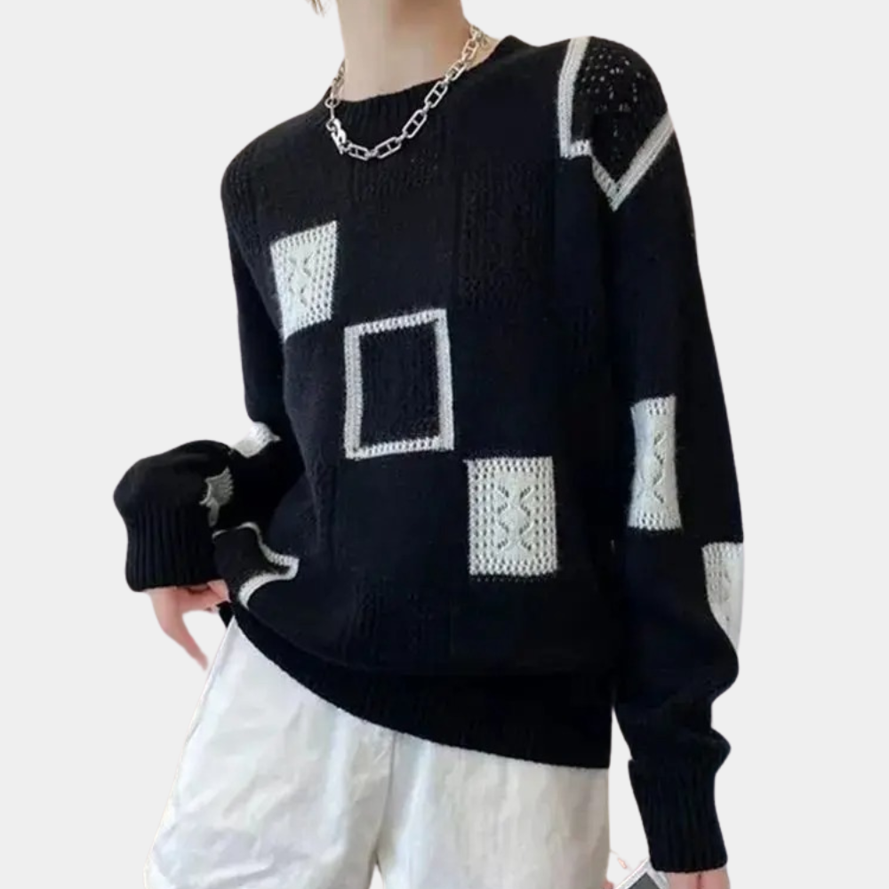 Zwarte trui met witte geometrische patronen, lange mouwen en ronde hals. Modieuze dameskleding, perfect voor casual en stijlvolle outfits.