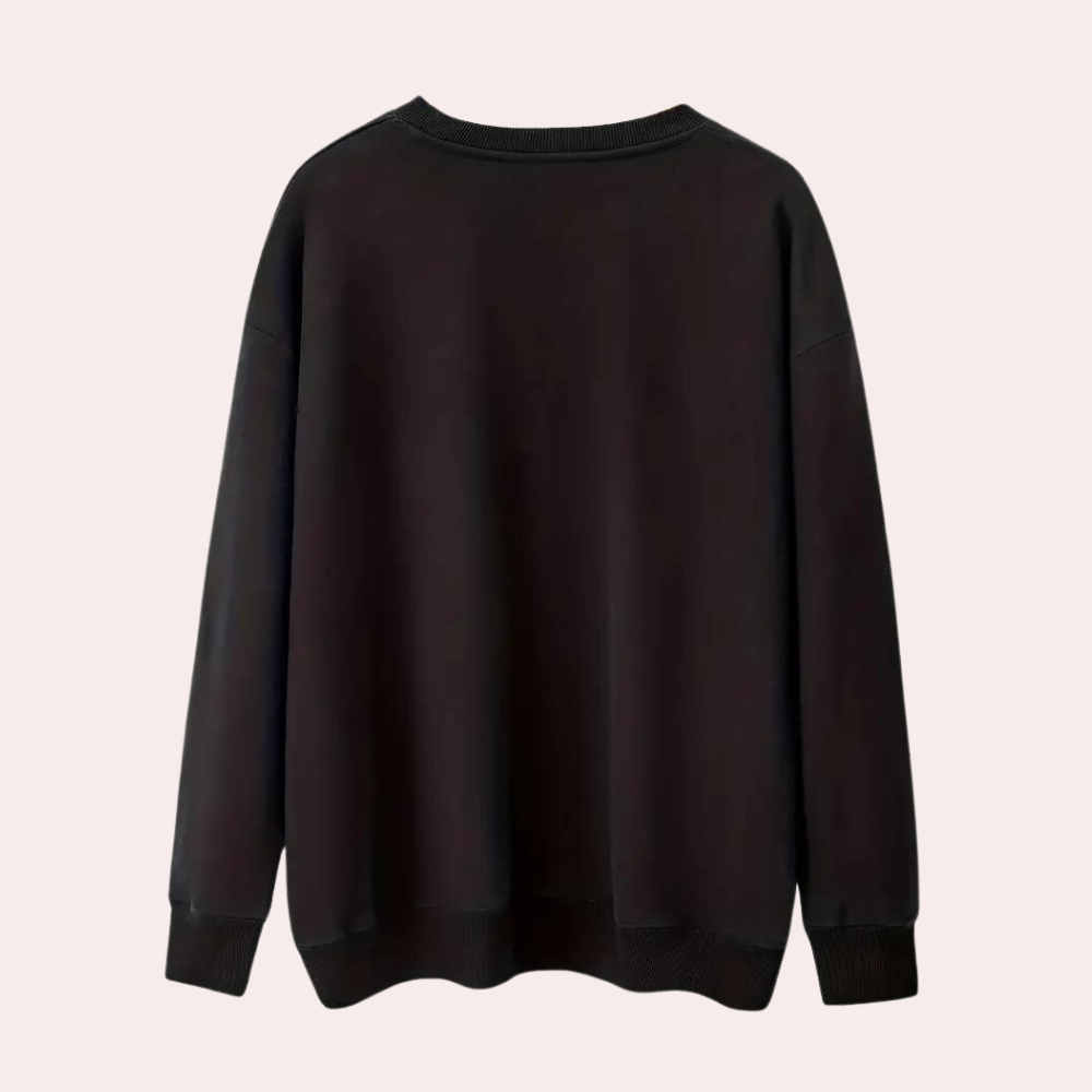 Zwarte oversized trui, uniseks design, lange mouwen, ronde hals. Comfortabele casual kleding, perfect voor herfst en winter.