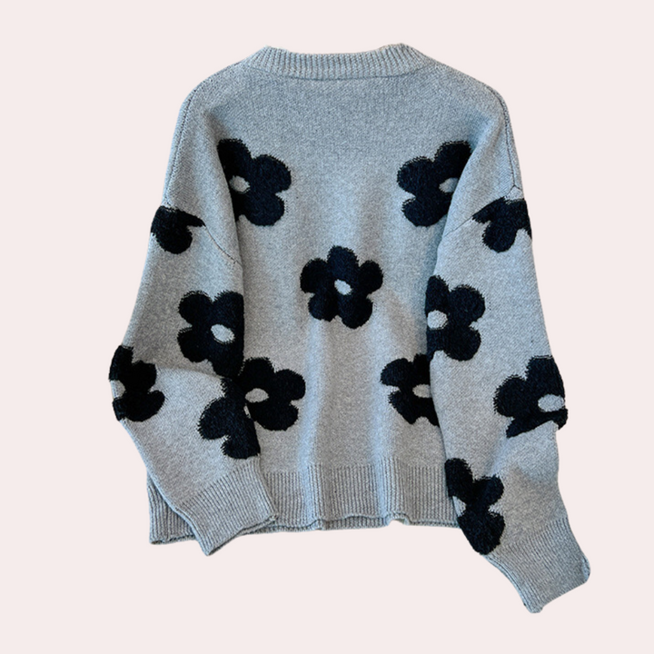 Grijze trui met zwarte bloemenprint, damesmode, gebreide sweater, trendy herfstkleding, comfortabele casual stijl, lange mouwen.