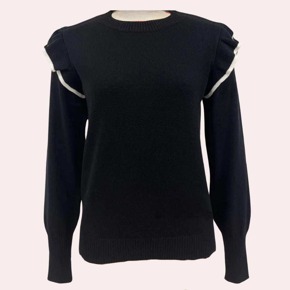 Zwarte damestrui met lange mouwen en ruches op de schouders, gemaakt van zachte stof. Perfect voor casual en stijlvolle outfits.