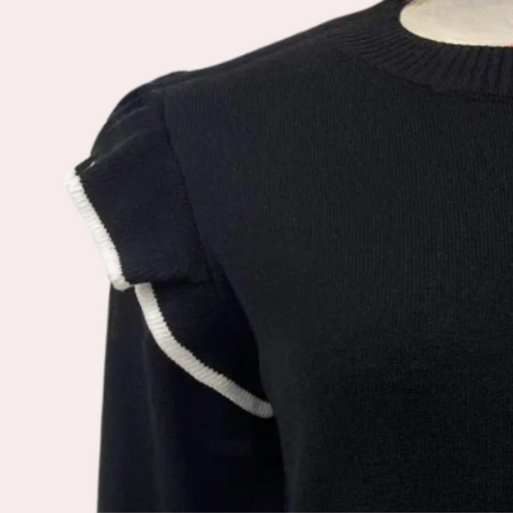 Zwarte damestrui met witte details, ronde hals en korte mouwen. Stijlvolle en moderne kleding voor casual en formele gelegenheden.