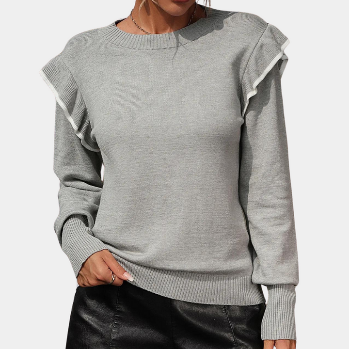 Grijze damestrui met ruches, lange mouwen en ronde hals. Modieuze en comfortabele sweater, perfect voor casual en stijlvolle outfits.