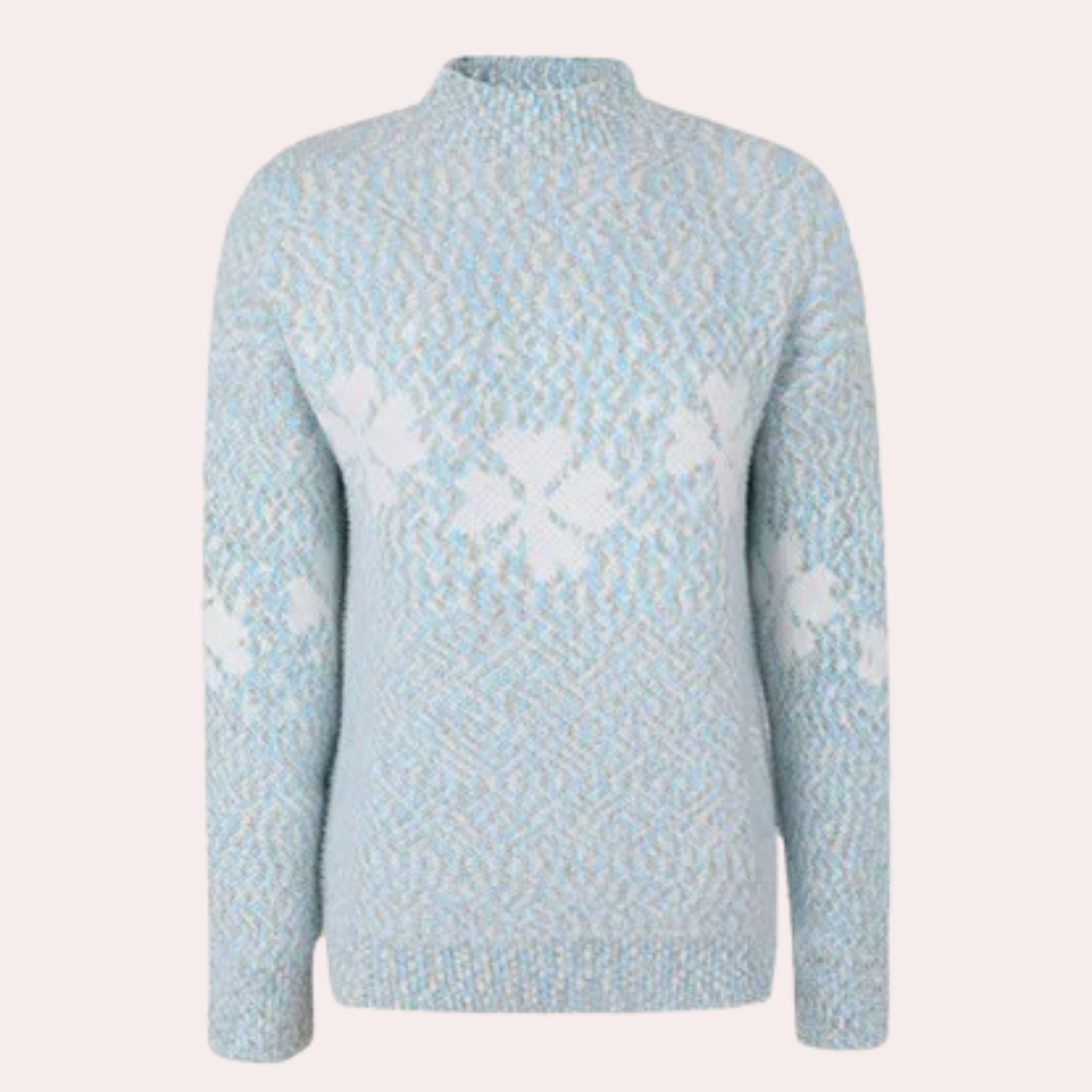 Lichtblauwe damestrui met witte bloemenpatroon, lange mouwen en ronde hals. Perfect voor wintermode en casual outfits. Comfortabel en stijlvol.