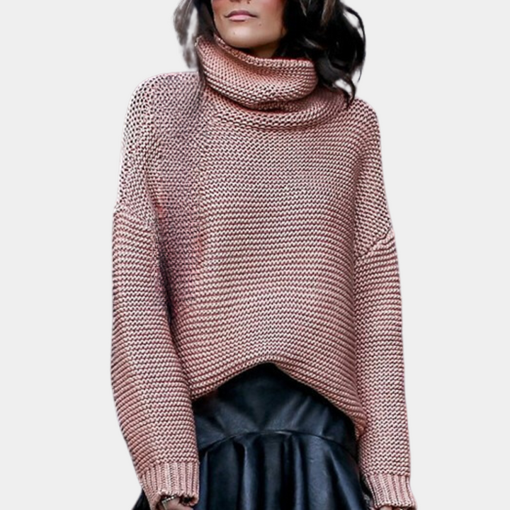Roze gebreide coltrui voor dames, modieus en comfortabel, perfect voor herfst- en winterseizoenen. Ideaal voor casual en stijlvolle outfits.