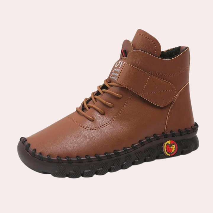 Bruine leren herenschoen met veters en klittenbandsluiting, comfortabele zwarte zool, casual stijl. Perfect voor dagelijks gebruik.