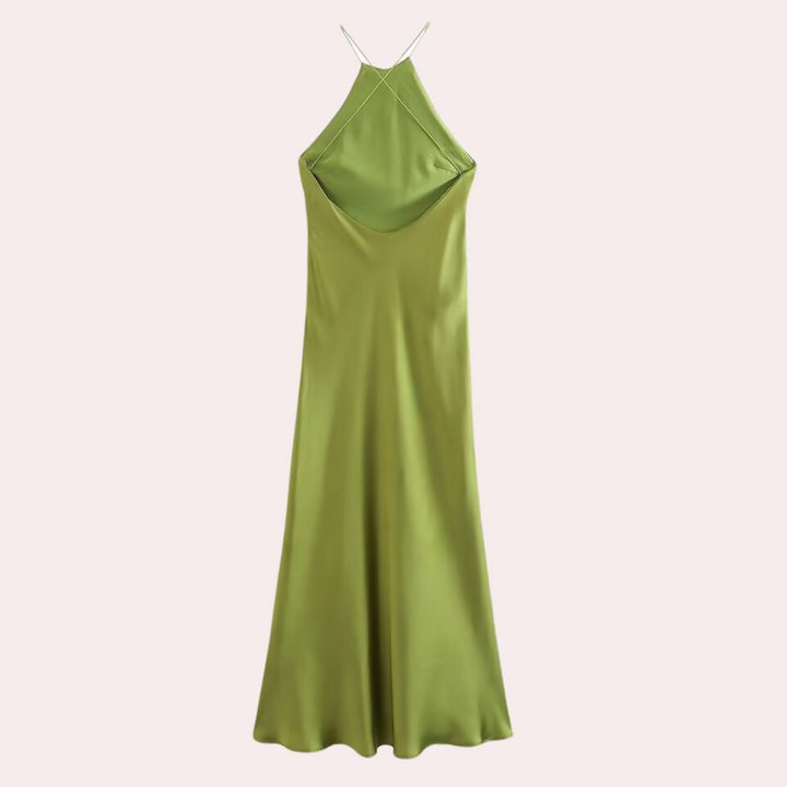 Groene satijnen halterjurk, elegante avondjurk met open rug, vloeiende stof, perfect voor feestjes en speciale gelegenheden.