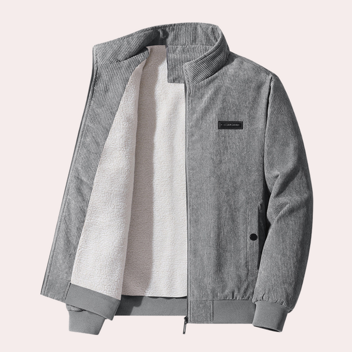 Grijze corduroy jas met opstaande kraag en witte fleece voering, ritssluiting en zakken. Stijlvolle herenjassen, wintermode, warme kleding.