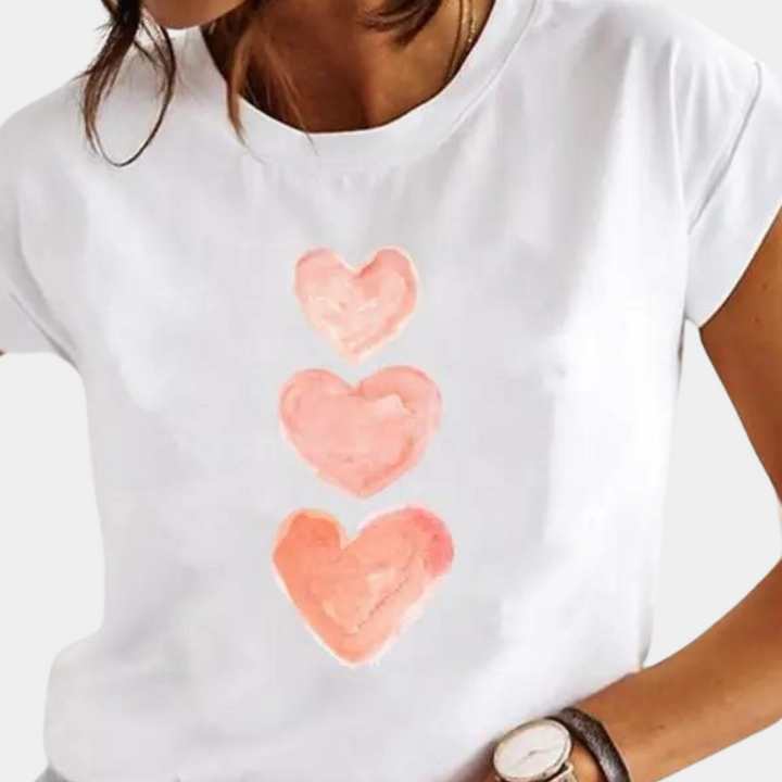 Dames T-shirt met drie roze hartjes, casual stijl, korte mouwen, ideaal voor zomermode. Perfect voor trendy en comfortabele outfits.
