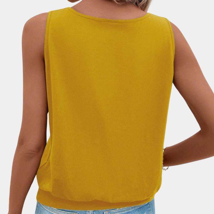 Dames gele mouwloze top, casual stijl, achterkant, lichtgewicht stof, perfect voor zomeroutfits, modieuze en comfortabele kleding.