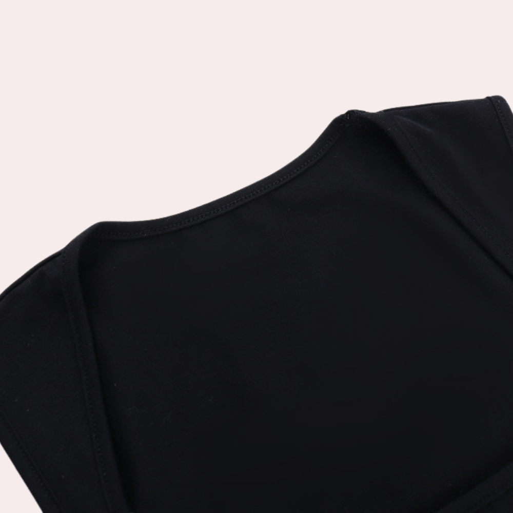 Zwarte mouwloze top, minimalistisch ontwerp, gemaakt van zachte stof. Ideaal voor casual en sportieve outfits. Comfortabele pasvorm.