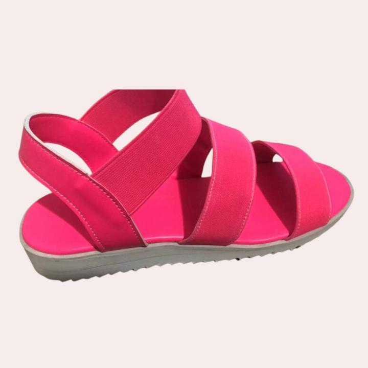 Roze dames sandaal met elastische banden en witte zool, comfortabele zomerschoen, modieus en lichtgewicht, ideaal voor casual outfits.