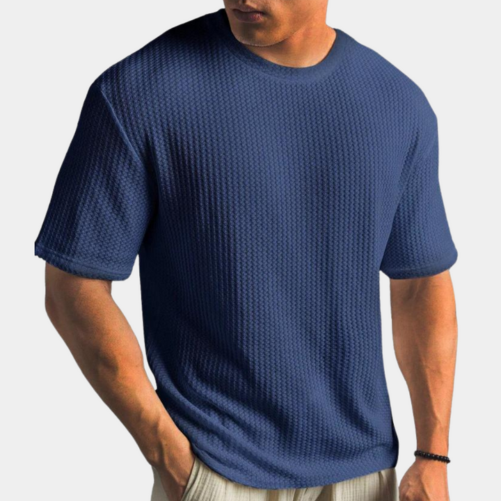 Blauw heren T-shirt met textuur, korte mouwen en ronde hals. Comfortabele pasvorm, ideaal voor casual outfits. Perfect voor dagelijks gebruik.