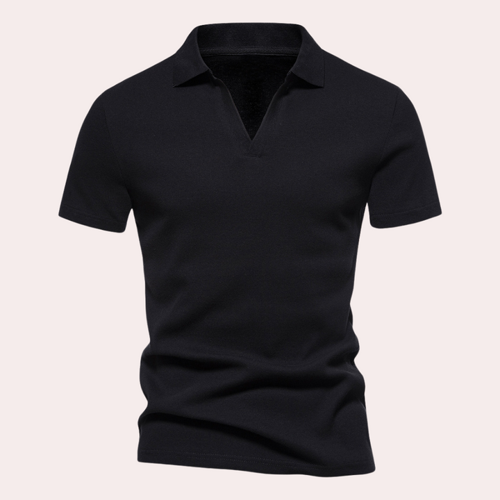Zwarte polo met korte mouwen en kraag, gemaakt van ademend katoen. Perfect voor casual en zakelijke outfits. Stijlvolle herenkleding.