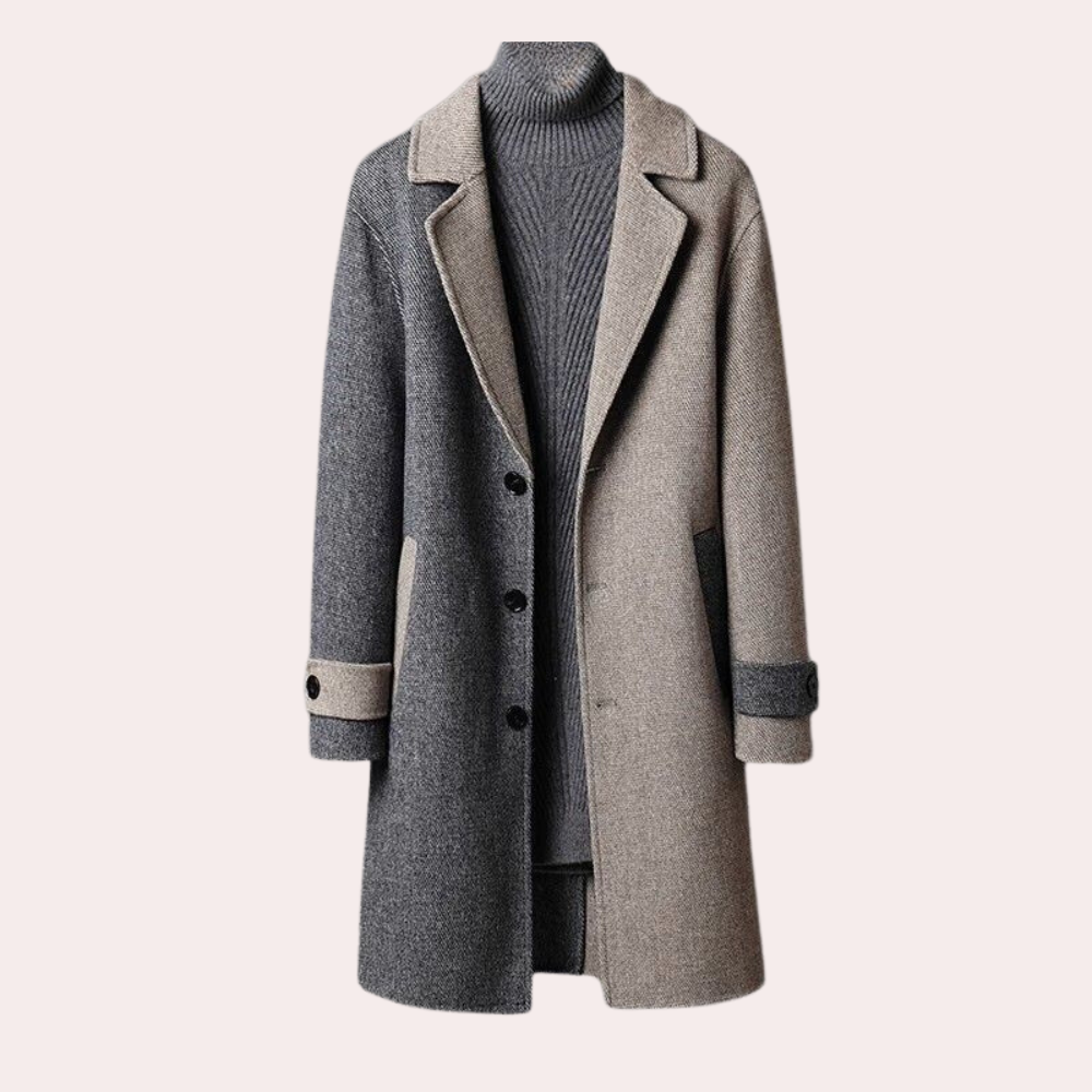Tweekleurige wollen herenjas met reverskraag, knopen en contrasterende mouwen. Stijlvolle wintermode, ideaal voor formele en casual gelegenheden.