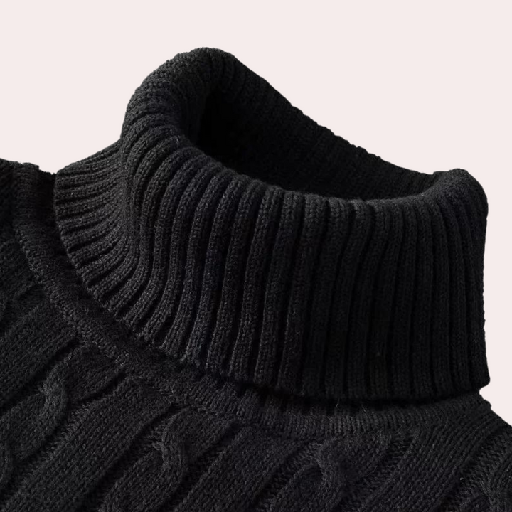 Zwarte coltrui met kabelpatroon, gemaakt van zachte wolmix. Perfect voor wintermode, biedt warmte en stijl. Ideaal voor casual en formele gelegenheden.