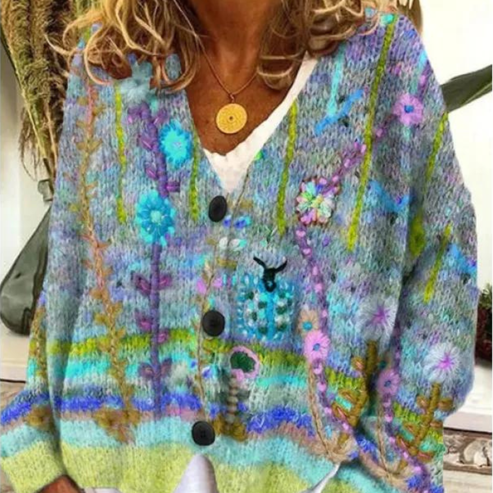 Dames gebreid vest met kleurrijk bloemenpatroon, V-hals en knoopsluiting. Perfect voor lente en zomer. Comfortabel en stijlvol design.