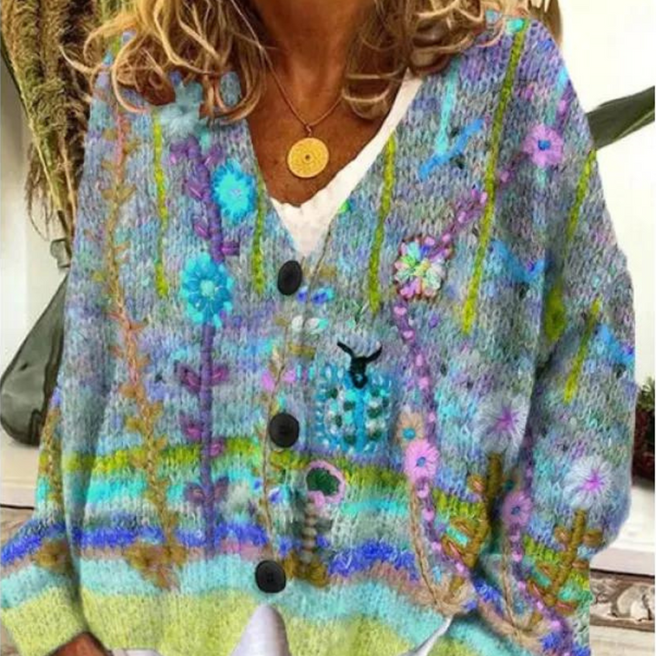 Dames gebreid vest met kleurrijk bloemenpatroon, V-hals en knoopsluiting. Perfect voor lente en zomer. Comfortabel en stijlvol design.