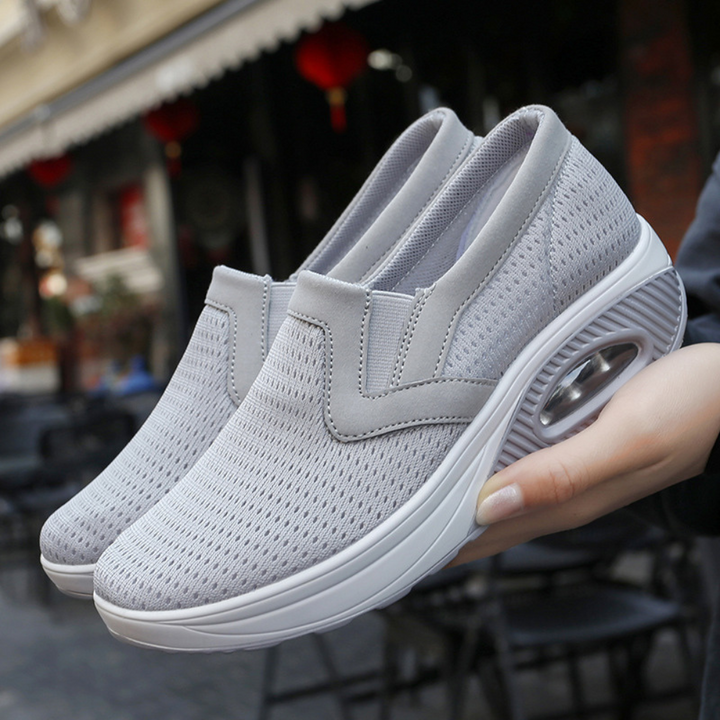 Grijze ademende sneakers met luchtkussen zool, comfortabele slip-on sportschoenen voor dames, ideaal voor wandelen en dagelijks gebruik.