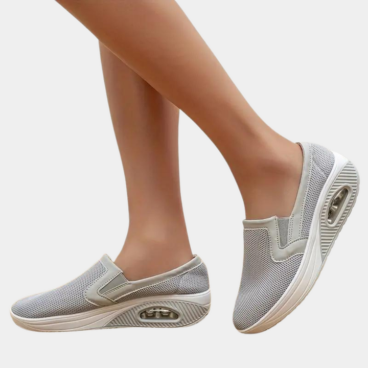 Grijze dames slip-on sneakers met luchtkussen zool, ademend mesh bovenwerk, comfortabele en modieuze schoenen voor dagelijks gebruik.